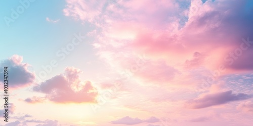 Pink and blue sky with fluffy clouds.