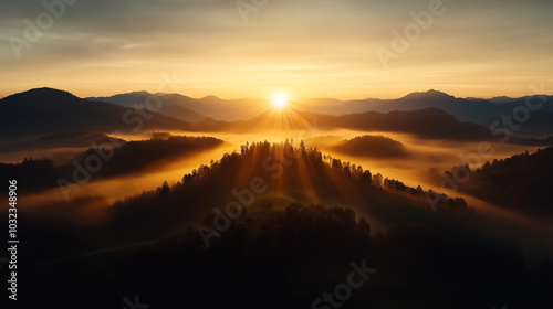 Serene sunrise over misty mountain landscape