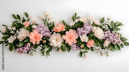 Elegant and delicate arrangement of pastel colored spring blossoms such as lilacs cherry blossom and jasmine beautifully composed in a natural
