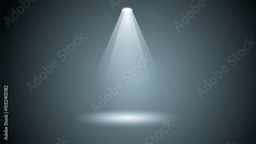 A light shining on a dark background. The light is white and the background is gray. The light is focused on a single point, creating a sense of depth and dimension