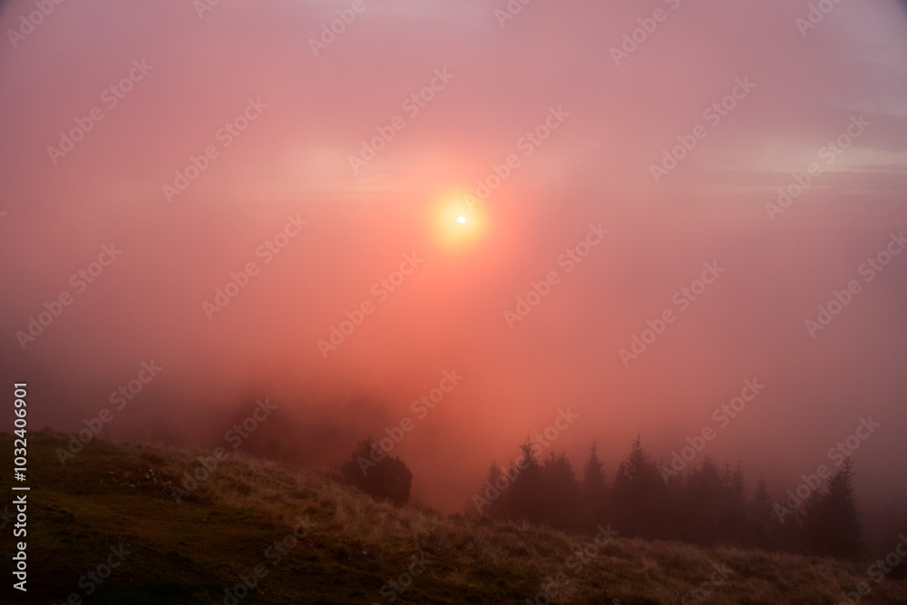 Sunrise in the fog, Ceahlau Mountains, Romania Sunrise in the fog, Ceahlau Mountains, Romania