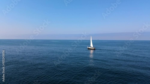 4K Drone Footage of a Sailboat in Sunny Seas