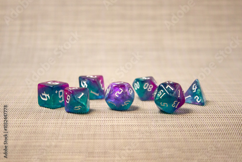 Set of dice for fantasy dnd and rpg tabletop games Board game polyhedral dices with different sides on wooden background