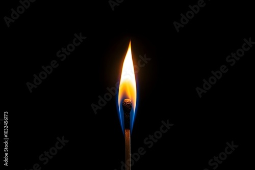 burning match on black background