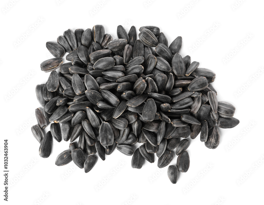 Pile of sunflower seeds isolated on white, top view Pile of sunflower seeds isolated on white, top view