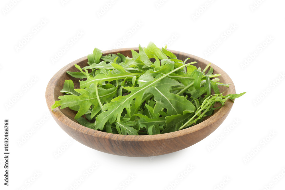 Fresh arugula leaves in bowl isolated on white Fresh arugula leaves in bowl isolated on white