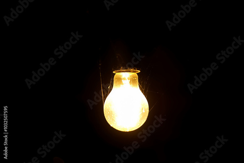 light bulb on black background