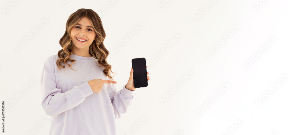 Close up portrait of a smiling woman showing blank screen mobile phone while standing isolated over white background Close up portrait of a smiling woman showing blank screen mobile phone while standing isolated over white background