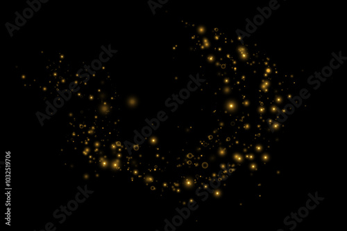 Gold sparks and golden stars glitter special light effect. Vector sparkles on transparent background. Christmas abstract.