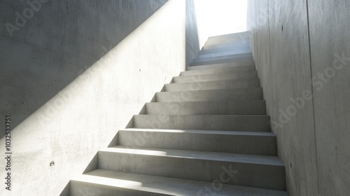 A staircase leading upwards, illuminated by natural light from above.