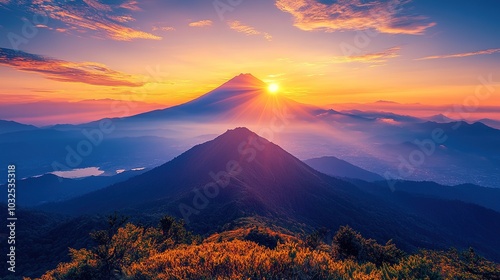 Breathtaking sunrise over a majestic mountain, illuminating the tranquil landscape