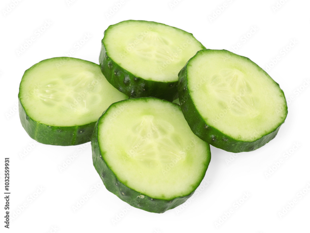 Slices of fresh cucumber isolated on white, above view Slices of fresh cucumber isolated on white, above view