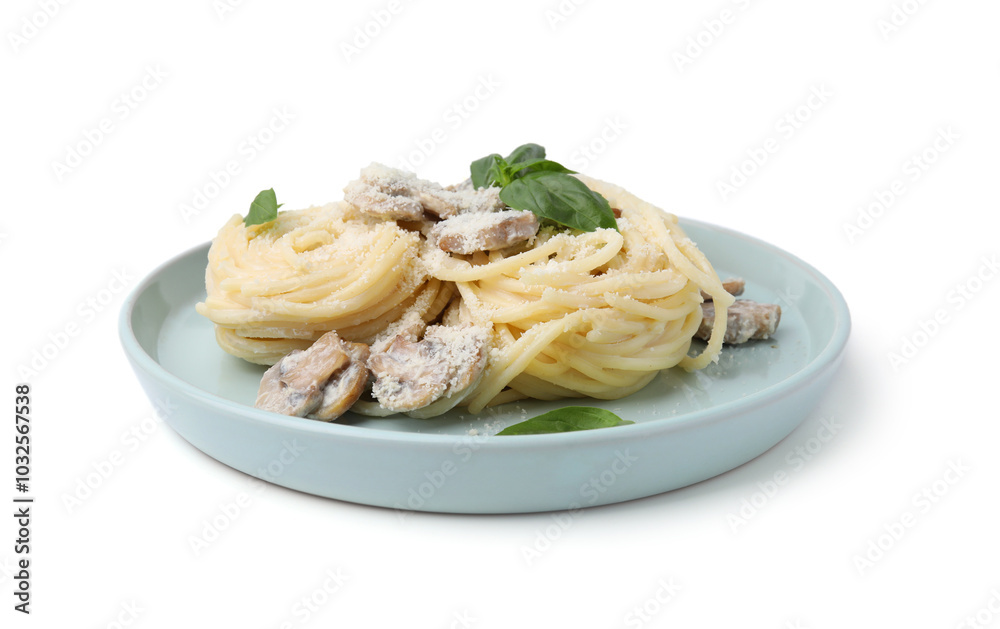 Delicious pasta with mushrooms and basil isolated on white Delicious pasta with mushrooms and basil isolated on white