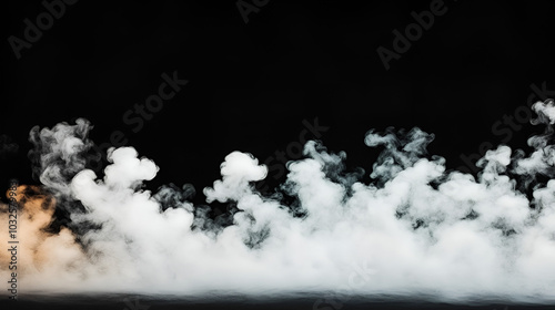 heavy fog passing across a black background.