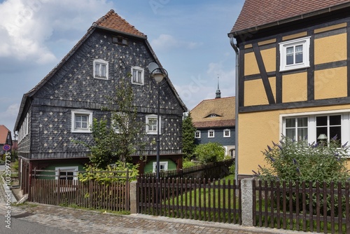 Obercunnersdorf Oberlausitz, Saxonia. Germany. Museum village. Half timbered houses route. Houses with slates. photo