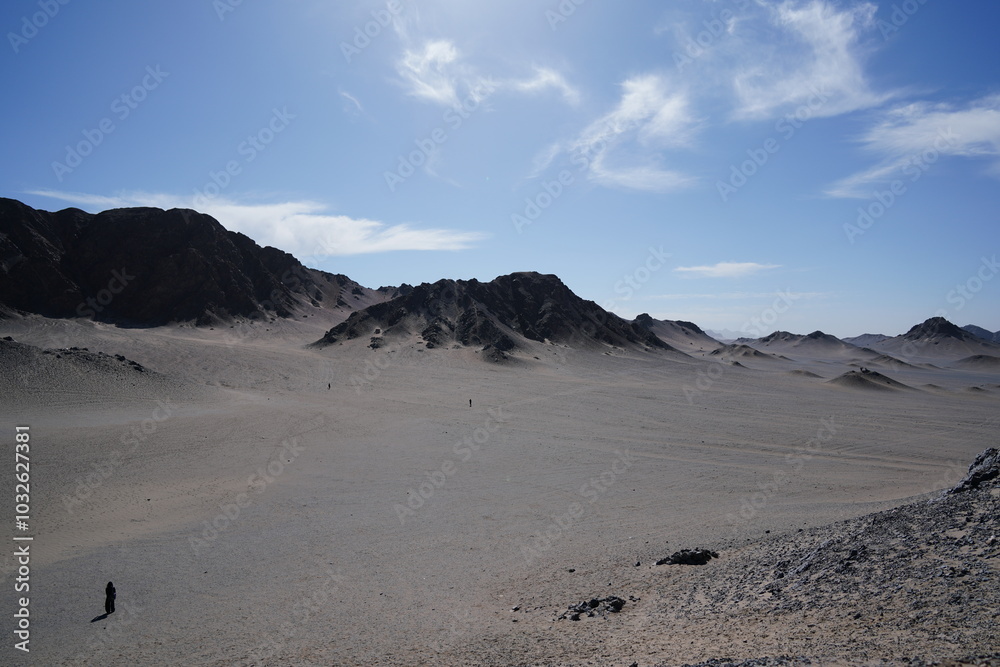 Heidu Mountain, black mountain in sands Heidu Mountain, black mountain in sands