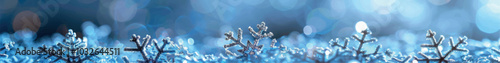 Snowflakes vector banner template for print, photo wallpaper. Winter background snowflakes on a blue background. Weather forecast winter, snow, frost, cold weather. New Year and Christmas background