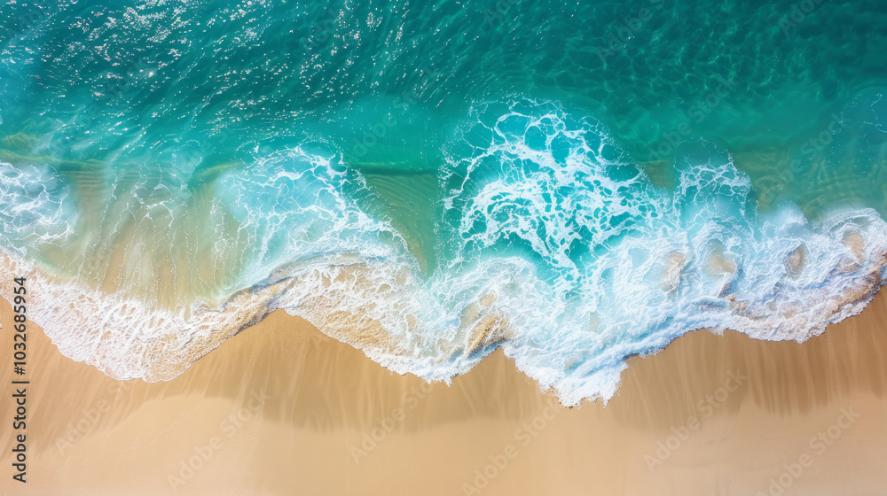 Top down aerial view of a serene coastal landscape with waves crashing on sandy beach. Concept of nature, travel, scenic ocean shoreline, tranquil beach scene. background Top down aerial view of a serene coastal landscape with waves crashing on sandy beach. Concept of nature, travel, scenic ocean shoreline, tranquil beach scene. background