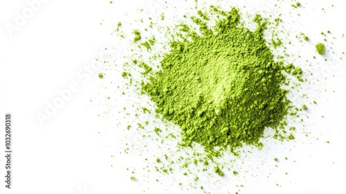 A pile of green powder, likely matcha or spirulina, on a white background.