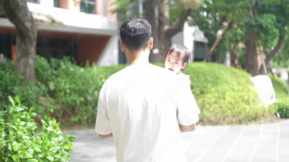 A Taiwanese family, consisting of a father in his 30s, a mother in her 20s, and their 1-year-old daughter, are walking apartment in Taichung City, Taiwan.Realtime, Horizontal Video. A Taiwanese family, consisting of a father in his 30s, a mother in her 20s, and their 1-year-old daughter, are walking apartment in Taichung City, Taiwan.Realtime, Horizontal Video.