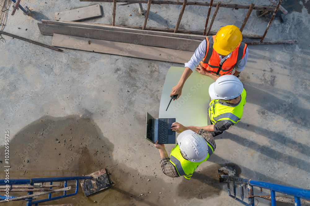 custom made wallpaper toronto digitalTwo Asian engineer working at site of a large building project,Work overtime at construction site,Team of engineer discus at site,The architect, supervisor, and foreman meet to discuss the design