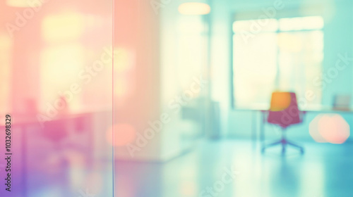 A dreamy open office space with blurred chairs and desks bathed in soft pastel tones