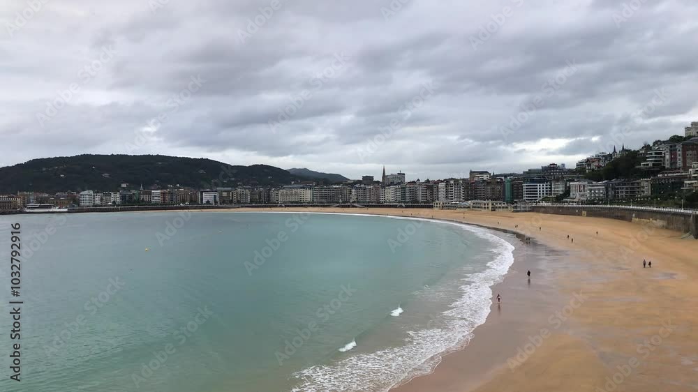 Cloudy summer afternoon at Concha beach, San Sebastian Cloudy summer afternoon at Concha beach, San Sebastian