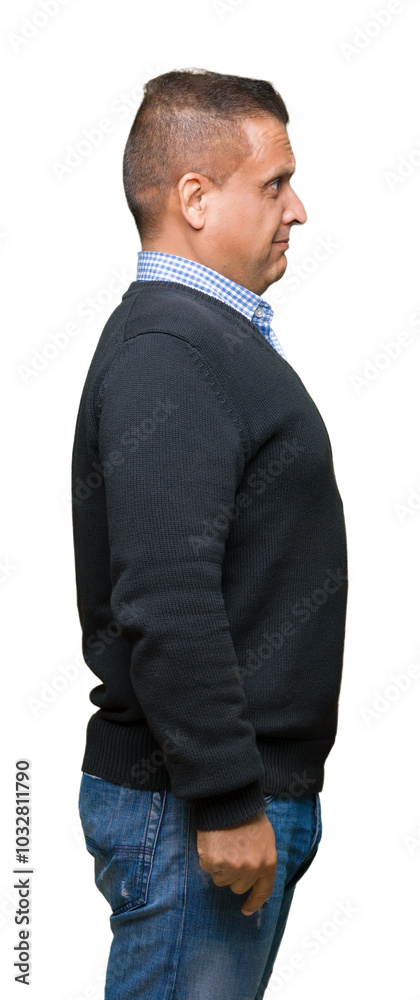 Handsome middle age man over isolated background looking to side, relax profile pose with natural face with confident smile. Handsome middle age man over isolated background looking to side, relax profile pose with natural face with confident smile.