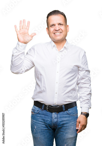 Middle age arab elegant man over isolated background showing and pointing up with fingers number five while smiling confident and happy.