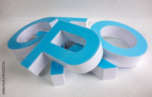 Luminous three-dimensional letters made of plastic or acrylic.Production of an outdoor advertising logo. photo