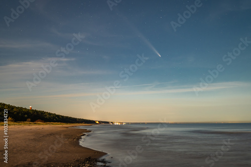 Fototapeta Naklejka Na Ścianę i Meble -  Comet C/2023 A3 Tsuchinshan–ATLAS over the Baltic sea cost in Jurmala, Latvia on October 16th, 2024