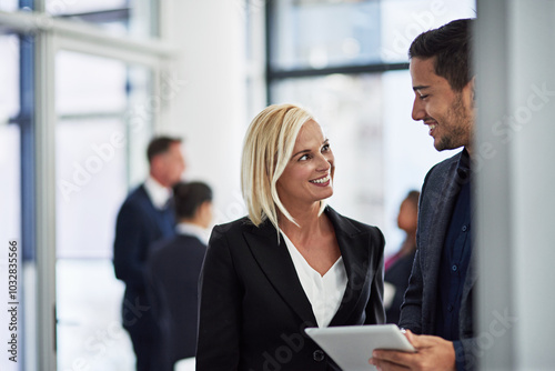 Smile, tablet and business people in office with discussion, ideas or planning online report together. Man, woman and digital app in meeting for collaboration advice, schedule or support in teamwork