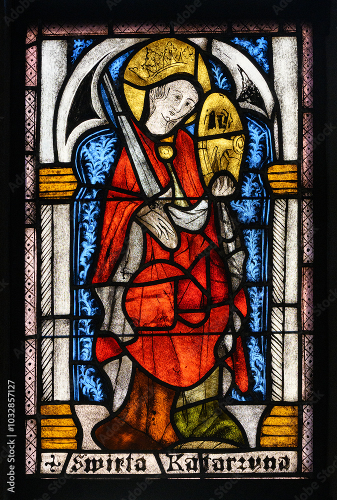 Obraz premium Saint Catherine of Alexandria. A stained-glass window in Kościół Świętej Trójcy [Holy Trinity Church] on in Kraków [Cracow], Poland.