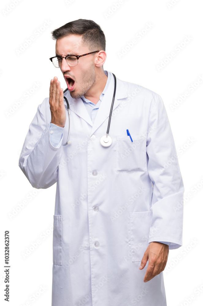 Handsome young doctor man bored yawning tired covering mouth with hand. Restless and sleepiness. Handsome young doctor man bored yawning tired covering mouth with hand. Restless and sleepiness.