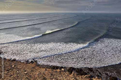 Chicama is famous for being home to one of the longest left-hand waves in the world. It is a renowned surf spot located in northern Peru, near the town of Puerto Malabrigo, in the La Libertad region photo