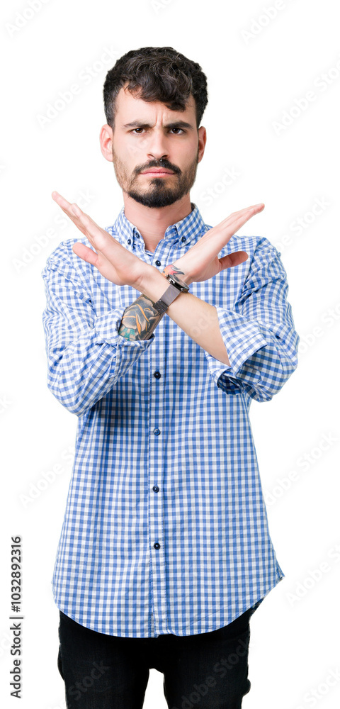 Young handsome business man over isolated background Rejection expression crossing arms doing negative sign, angry face Young handsome business man over isolated background Rejection expression crossing arms doing negative sign, angry face