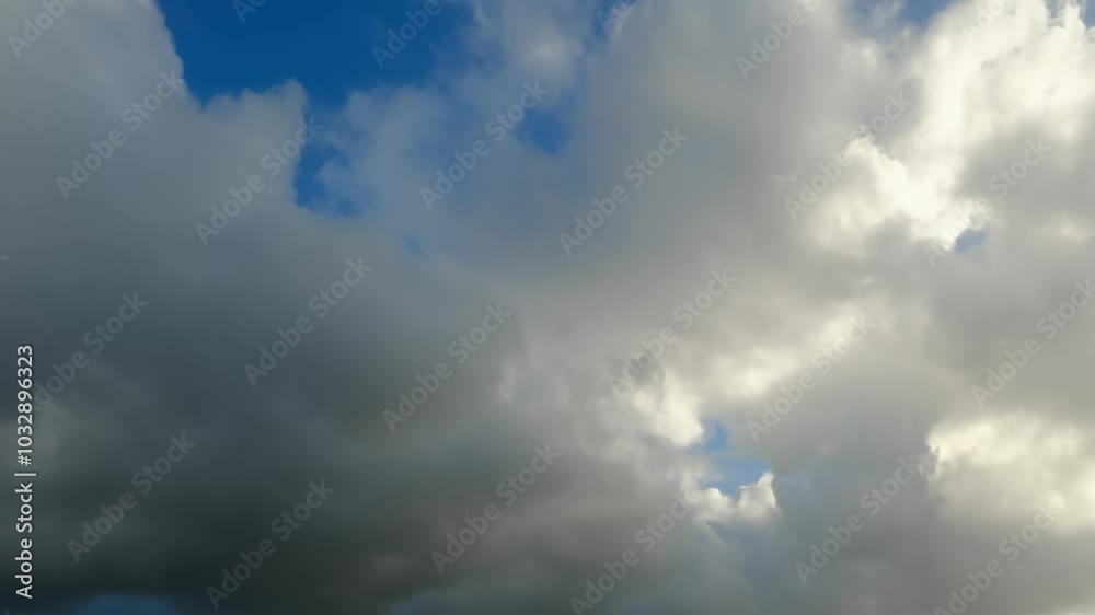White clouds rush past. Timelapse shot of clouds in the sky White clouds rush past. Timelapse shot of clouds in the sky