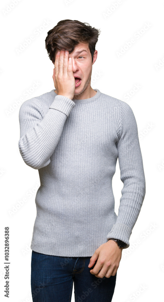 Young handsome man wearing winter sweater over isolated background Yawning tired covering half face, eye and mouth with hand. Face hurts in pain. Young handsome man wearing winter sweater over isolated background Yawning tired covering half face, eye and mouth with hand. Face hurts in pain.