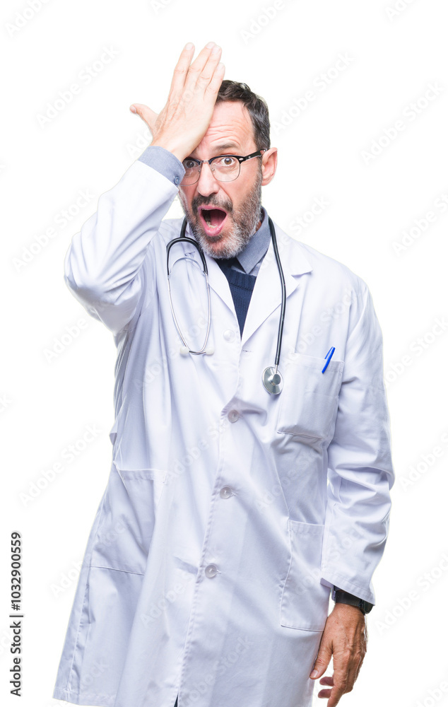 Middle age senior hoary doctor man wearing medical uniform isolated background surprised with hand on head for mistake, remember error. Forgot, bad memory concept. Middle age senior hoary doctor man wearing medical uniform isolated background surprised with hand on head for mistake, remember error. Forgot, bad memory concept.
