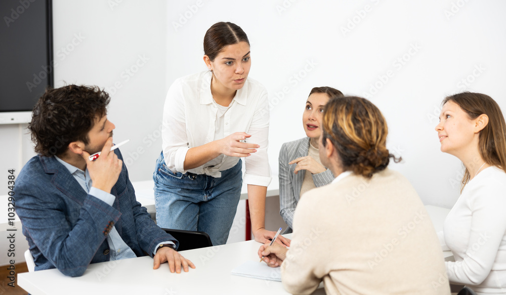 Obraz premium College students in study group preparing for test together