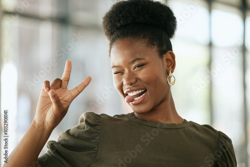 Tablou pe pânză Peace sign, fun and black woman in office, smile and tongue out for humor, hands and playful with confidence
