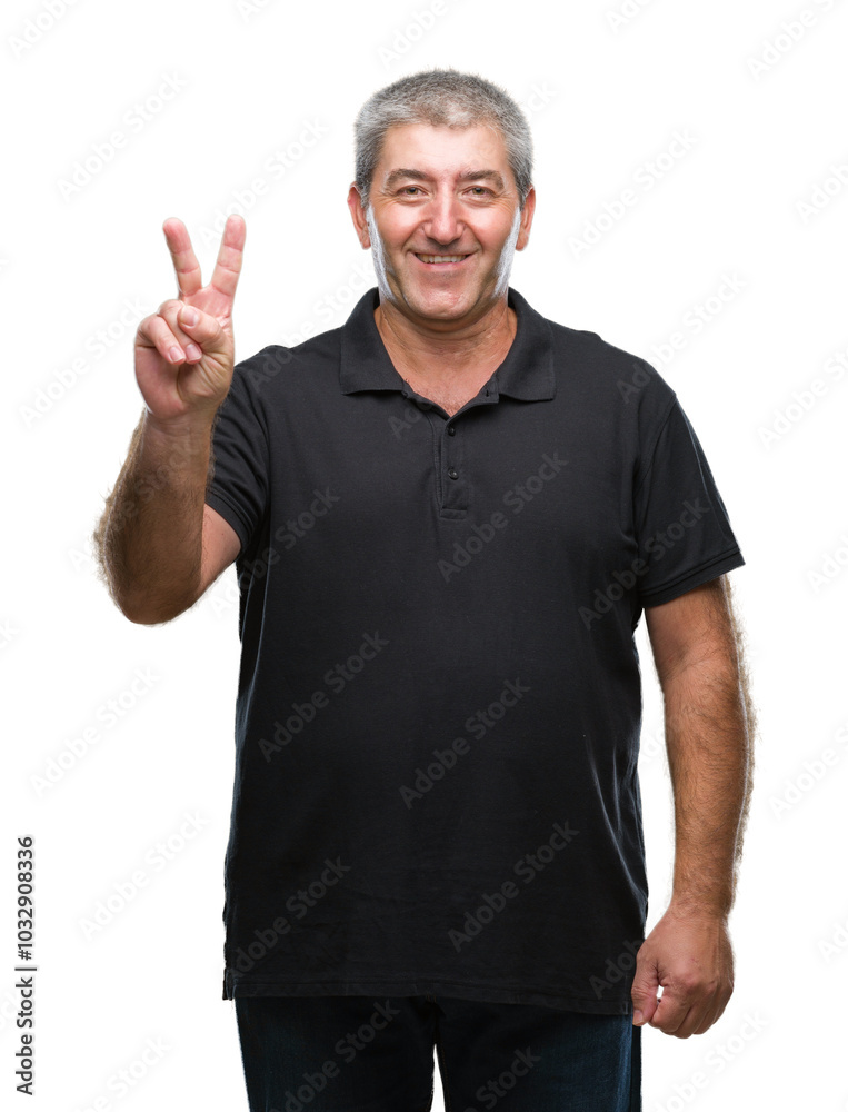 Fototapeta premium Handsome senior man over isolated background smiling with happy face winking at the camera doing victory sign. Number two.