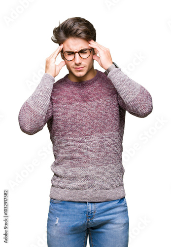 Young handsome man wearing glasses over isolated background with hand on head for pain in head because stress. Suffering migraine.