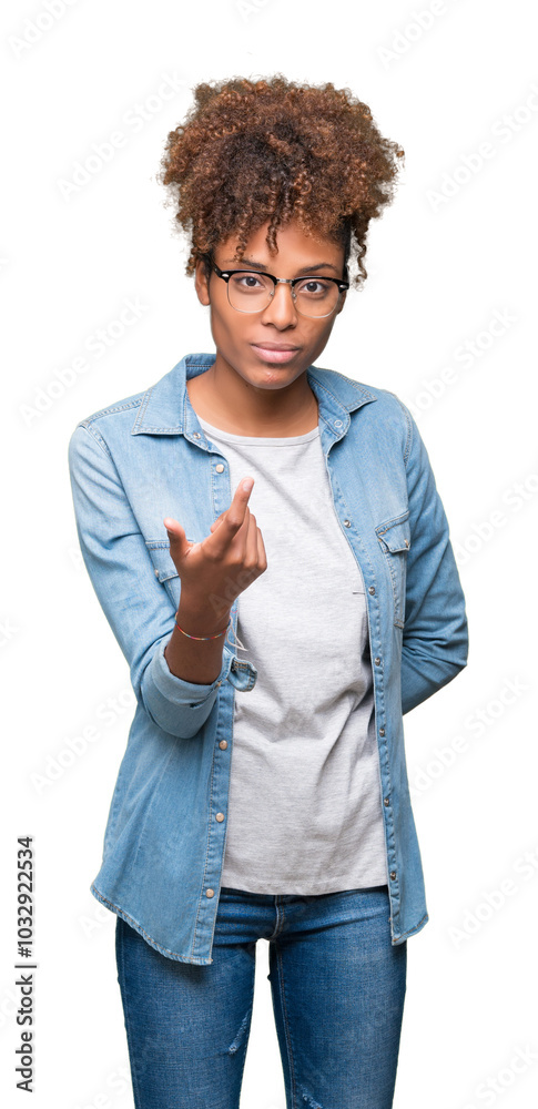 Beautiful young african american woman wearing glasses over isolated background Beckoning come here gesture with hand inviting happy and smiling Beautiful young african american woman wearing glasses over isolated background Beckoning come here gesture with hand inviting happy and smiling