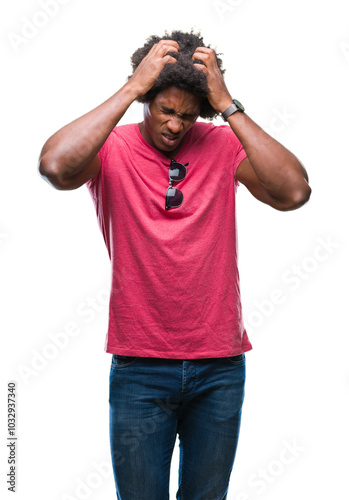 Afro american man over isolated background suffering from headache desperate and stressed because pain and migraine. Hands on head.