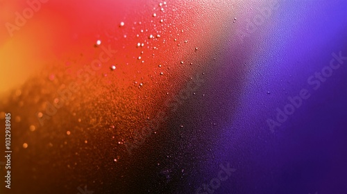 Abstract colorful background with red, orange, and purple gradient.