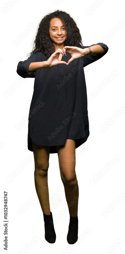 Young beautiful girl with curly hair wearing elegant dress smiling in love showing heart symbol and shape with hands. Romantic concept. Young beautiful girl with curly hair wearing elegant dress smiling in love showing heart symbol and shape with hands. Romantic concept.