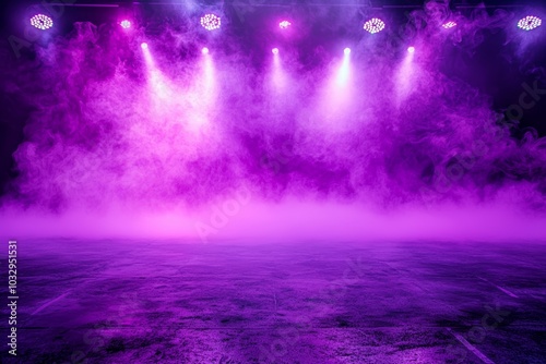 A purple stage with smoke and lights