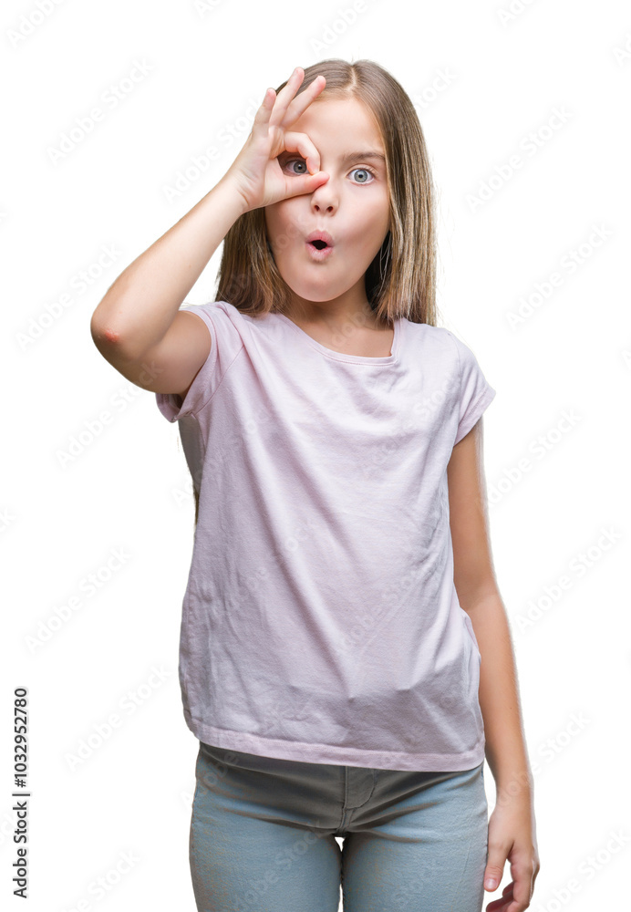 Young beautiful girl over isolated background doing ok gesture shocked with surprised face, eye looking through fingers. Unbelieving expression.