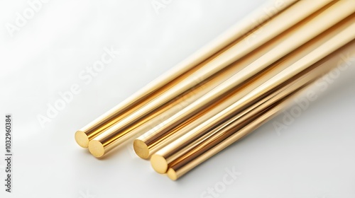 Gold Chopsticks isolated on white background. 